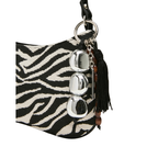 The Handbag Den Zebra Print Tassel Shoulder Bag for Women